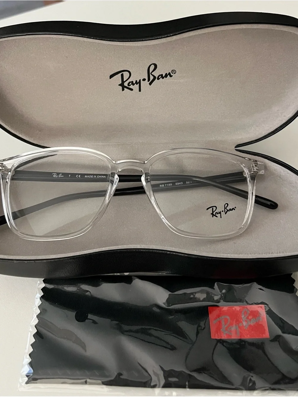 RayBan RB7185 Polarized Eyeglasses with Transparent frame UNISEX